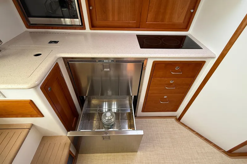 Slide: The Image of Modern galley kitchen in 2016 MJM 40z Downeast yacht with stainless steel appliances. - 33