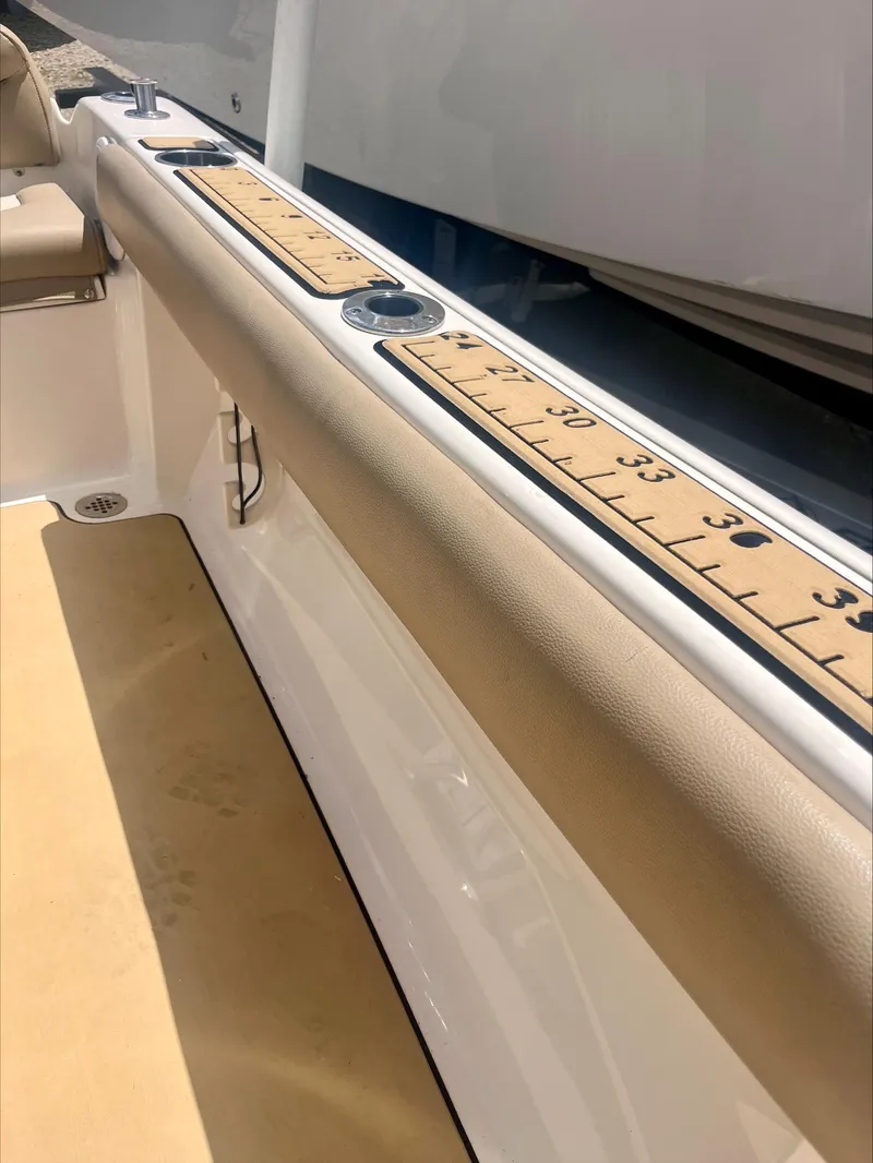 Slide: The Image of 2020 Key West 189 FS boat interior with built-in measuring ruler. - 17