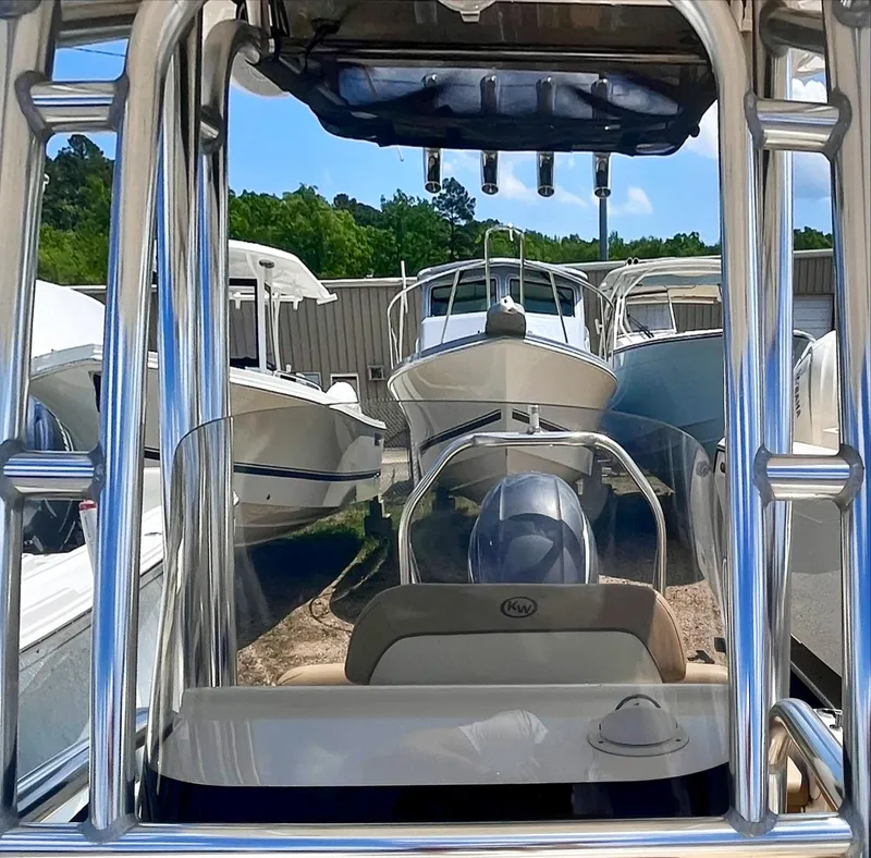 Slide: The Image of 2020 Key West 189 FS boat in storage, surrounded by other boats. - 5