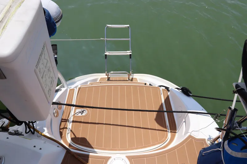 Slide: The Image of Lagoon 380 catamaran stern with swim platform and ladder, 2001 model. - 22