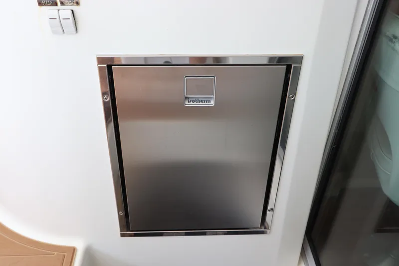 Slide: The Image of Stainless steel hatch on 2001 Lagoon 380 catamaran interior. - 35