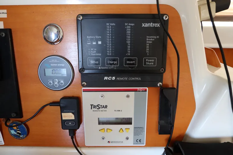 Slide: The Image of Control panel of a 2001 Lagoon 380 catamaran with Xantrex and TriStar systems. - 44