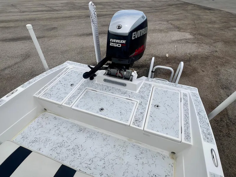 Slide: The Image of 2015 Shallow Sport 24 Modified V boat with Evinrude 250 engine, rear deck view. - 7