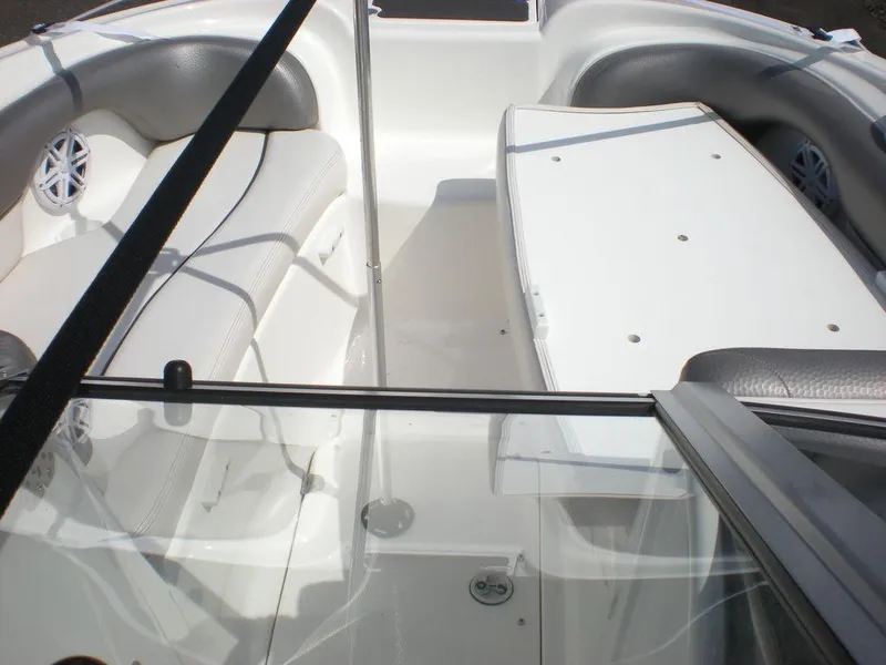 Slide: The Image of 2011 Yamaha Boats AR210 interior with seating and storage area. - 6