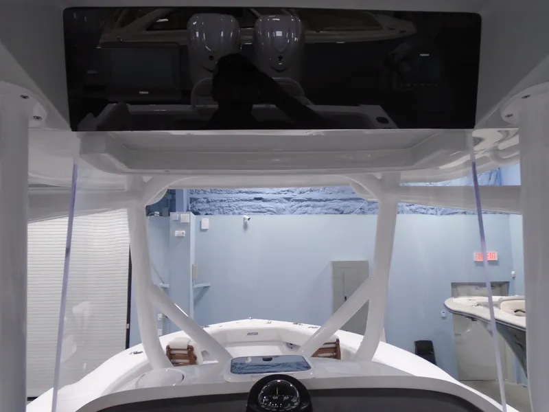 Slide: The Image of 2025 Jupiter 32 boat interior with modern design and advanced navigation equipment. - 23