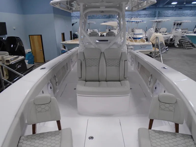Slide: The Image of Interior view of 2025 Jupiter 32 boat with luxurious seating and modern design. - 28