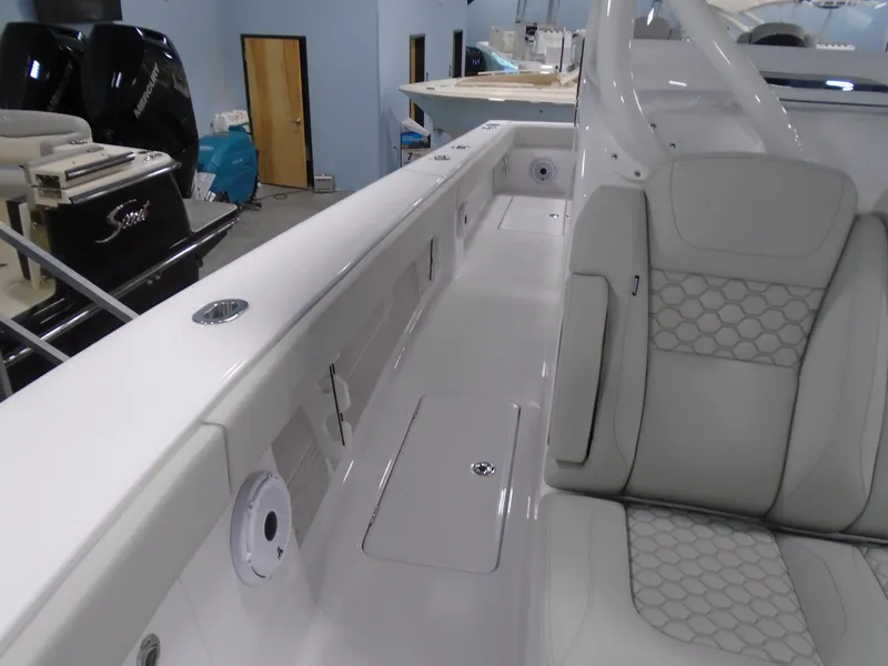 Slide: The Image of 2025 Jupiter 32 boat interior with white seating and sleek design. - 31