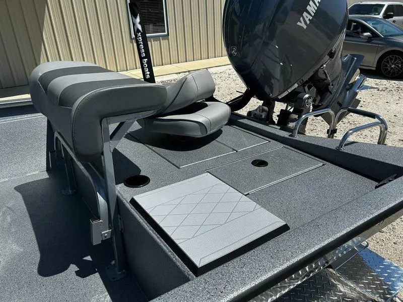 Slide: The Image of 2025 Xpress H210B boat with Yamaha engine, featuring comfortable seating and sleek design. - 11