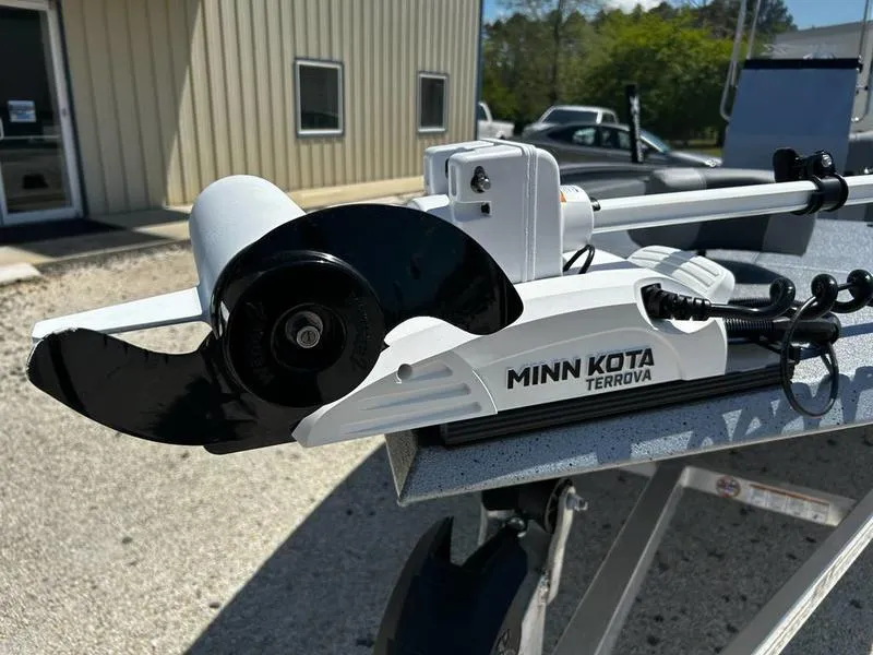 Slide: The Image of Minn Kota Terrova motor on Xpress H210B boat, 2025 model, outdoors. - 7
