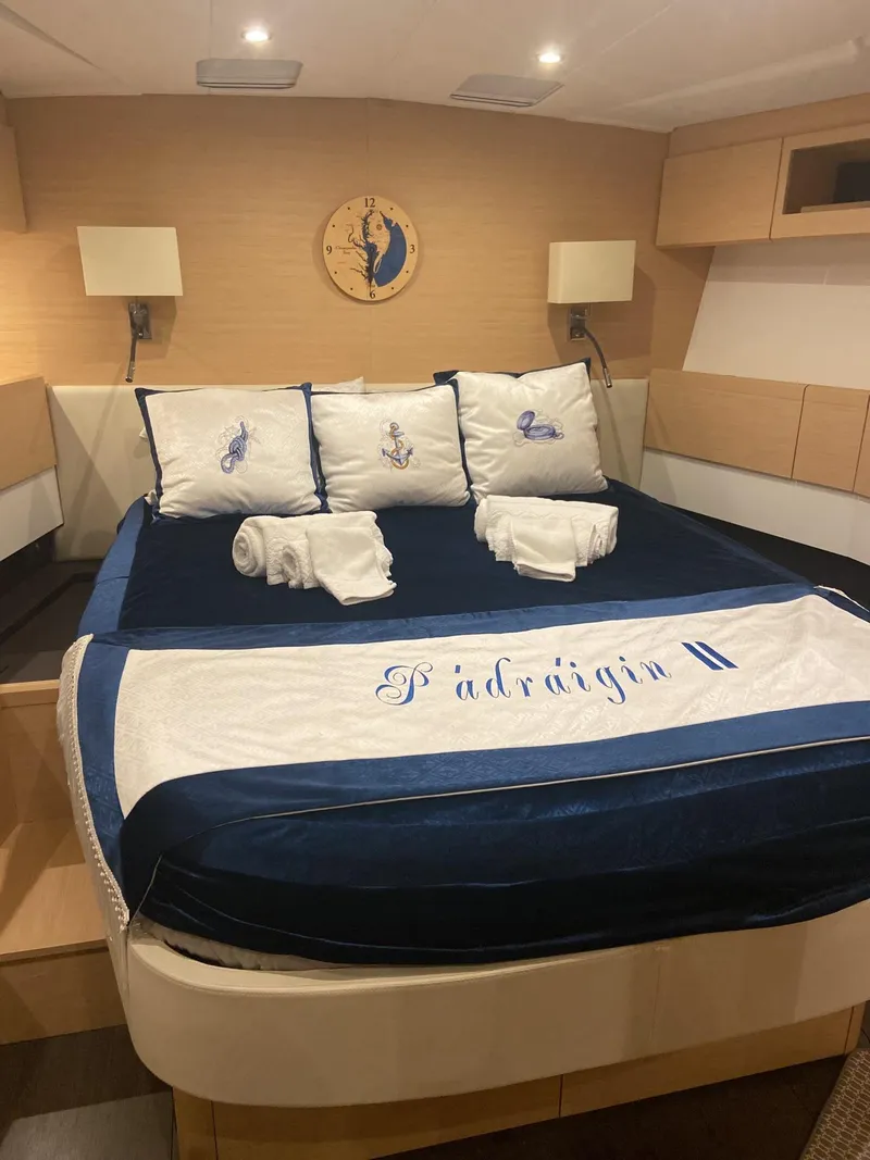 Slide: The Image of Luxurious bedroom interior of 2016 Jeanneau 58 yacht with elegant bedding and decor. - 8