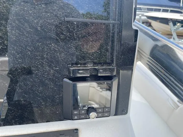 Slide: The Image of Control panel on a 2022 Sea Hunt Ultra 229 boat dashboard. - 10