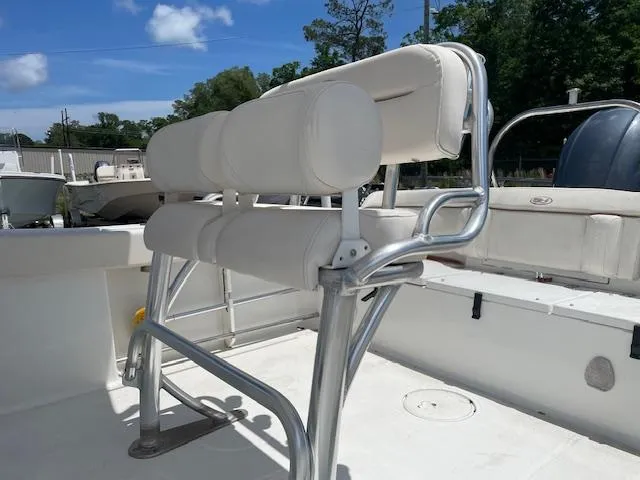 Slide: The Image of 2022 Sea Hunt Ultra 229 boat with cushioned seating and stainless steel frame. - 6