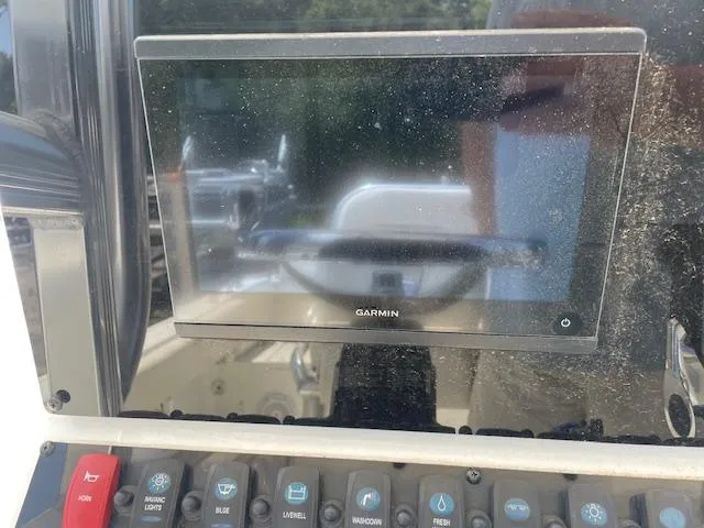 Slide: The Image of Control panel of a 2022 Sea Hunt Ultra 229 boat with Garmin display. - 9