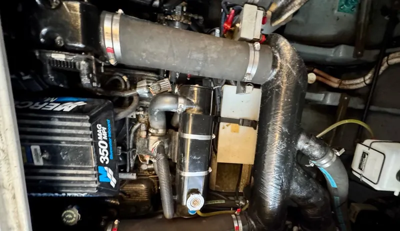 Slide: The Image of Engine compartment of a 2000 Sea Ray 310 Sundancer with MerCruiser 350 MAG engine. - 38