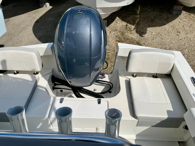 Slide: The Image of 2022 Parker 2100 Special Edition boat with outboard motor and seating. - 4