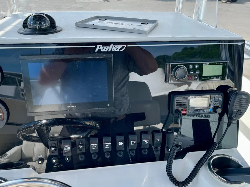 Slide: The Image of Parker 2100 Special Edition 2022 boat dashboard with navigation and communication equipment. - 6