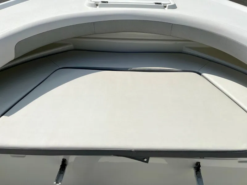 Slide: The Image of 2022 Parker 2100 Special Edition boat interior with cushioned seating area. - 9