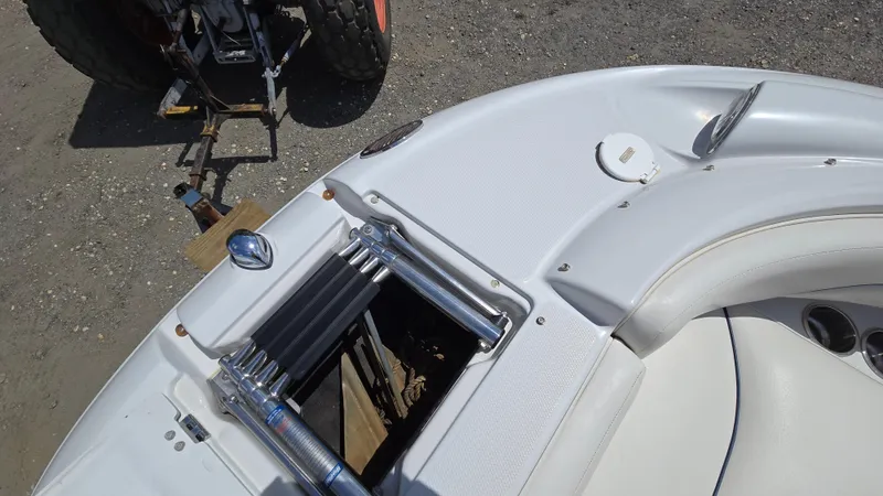 Slide: The Image of 2006 Crownline 262 EX boat with ladder and seating area, viewed from above. - 43