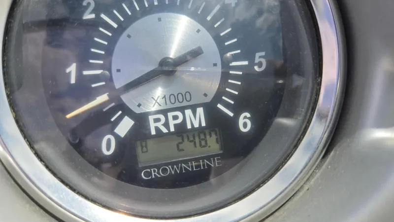 Slide: The Image of Tachometer of 2006 Crownline 262 EX boat showing 2487 RPM. - 49