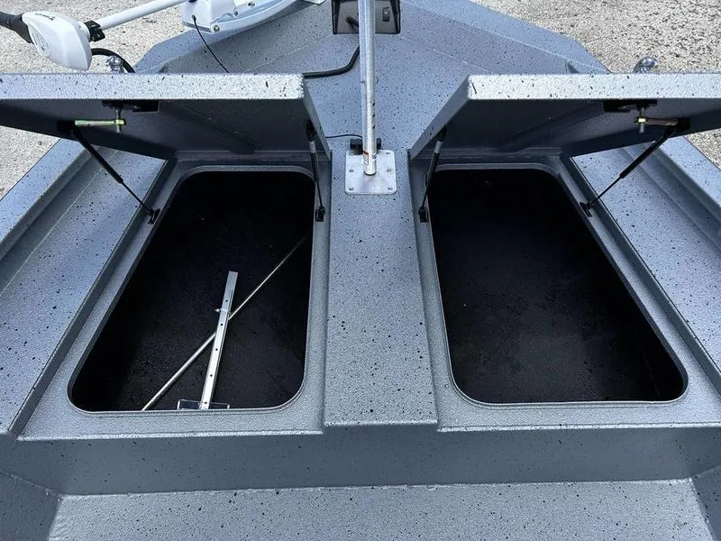 Slide: The Image of 2025 Xpress H190B boat with open storage compartments on deck. - 9