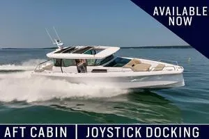 The Image of 2024 Axopar 45 boat cruising with aft cabin and joystick docking, available now. - 0