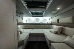 Slide: The Image of Luxurious interior of 2024 Axopar 45 boat with spacious seating and modern design. - 21