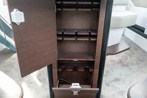 Slide: The Image of 2024 Axopar 45 XC Cross Cabin interior with cozy seating and modern design. - 13