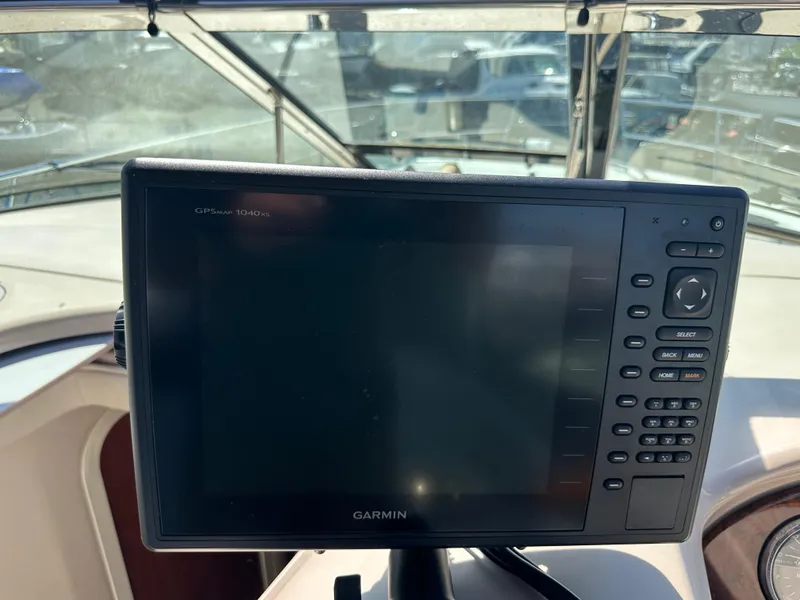 Slide: The Image of Garmin navigation system on 2004 Sea Ray 360 Sundancer yacht dashboard. - 43
