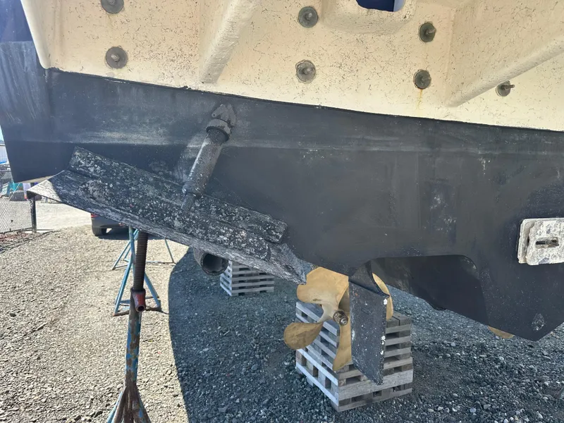 Slide: The Image of 2004 Sea Ray 360 Sundancer hull on blocks, showing underside details. - 9