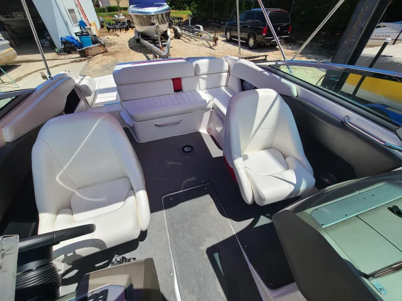 Slide: The Image of 2007 Regal 2200 Bowrider interior with white seating and modern design. - 20