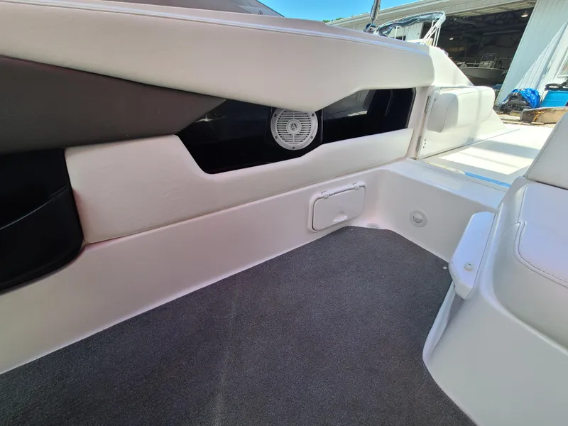 Slide: The Image of 2007 Regal 2200 Bowrider interior with speaker and seating, showcasing modern design. - 26