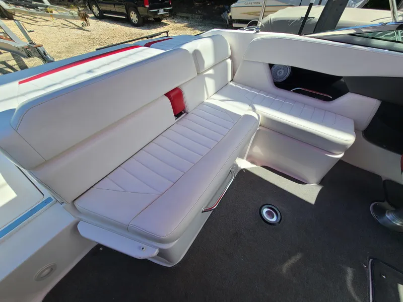Slide: The Image of 2007 Regal 2200 Bowrider interior with white leather seating and modern design. - 27