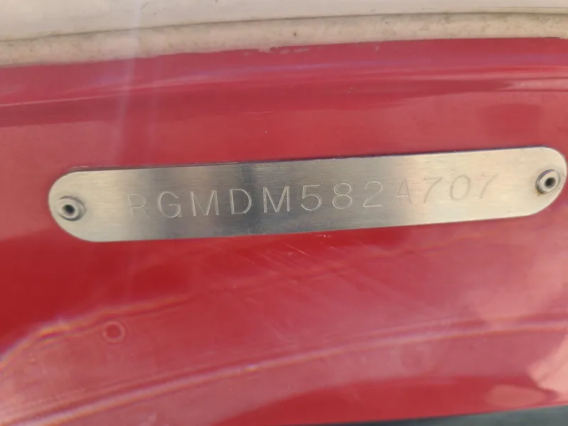 Slide: The Image of 2007 Regal 2200 Bowrider boat identification plate with serial number. - 48