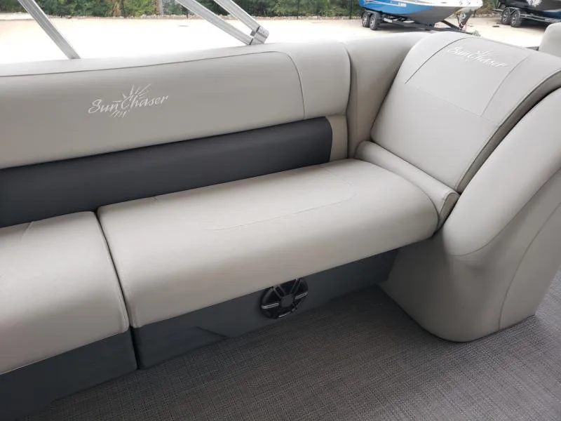 Slide: The Image of 2024 SunChaser Vista 22 LR boat interior with comfortable seating and sleek design. - 13