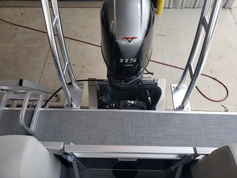 Slide: The Image of 2024 SunChaser Vista 22 LR boat with Yamaha 115 engine, viewed from above. - 7