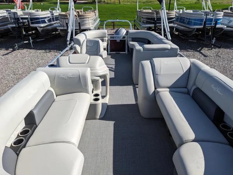 Slide: The Image of 2024 SunChaser Vista 22 LR pontoon boat with spacious seating and modern design. - 5