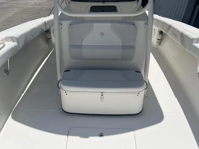 Slide: The Image of Edgewater 388CC 2013 boat interior with cushioned seating and storage. - 20