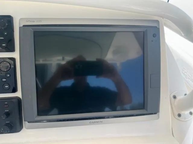 Slide: The Image of Garmin GPS display on 2013 Edgewater 388CC boat dashboard. - 5