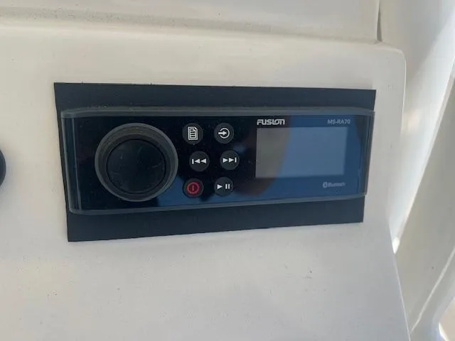 Slide: The Image of Fusion MS-RA70 Bluetooth stereo on 2013 Edgewater 388CC boat dashboard. - 9