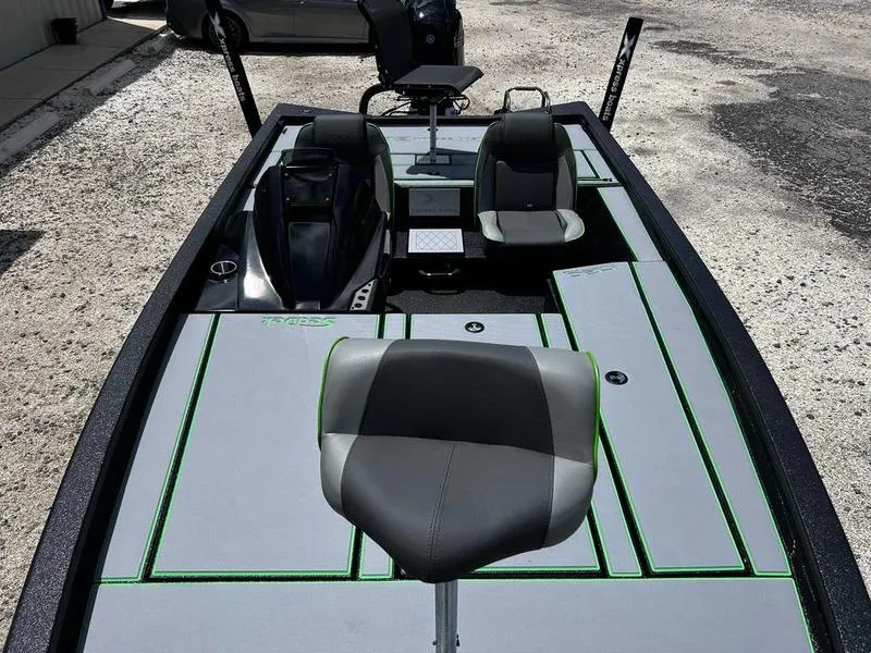 Slide: The Image of 2025 Xpress H20 Bass boat with sleek seating and modern design. - 12