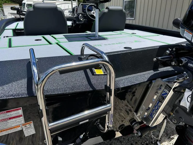 Slide: The Image of 2025 Xpress H20 Bass boat with ladder and seating, featuring modern design and equipment. - 18