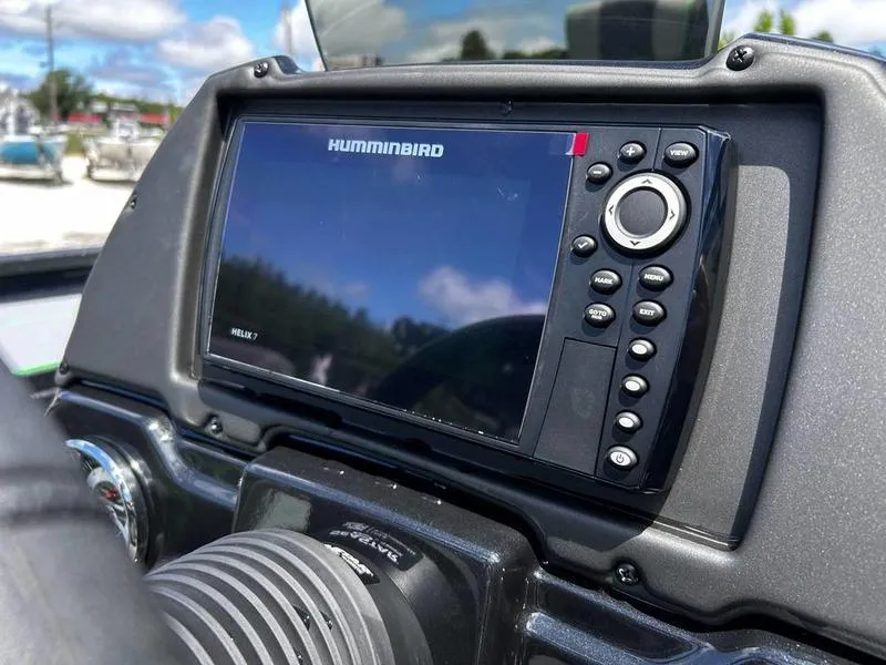 Slide: The Image of 2025 Xpress H20 Bass boat dashboard with Humminbird fish finder display. - 9