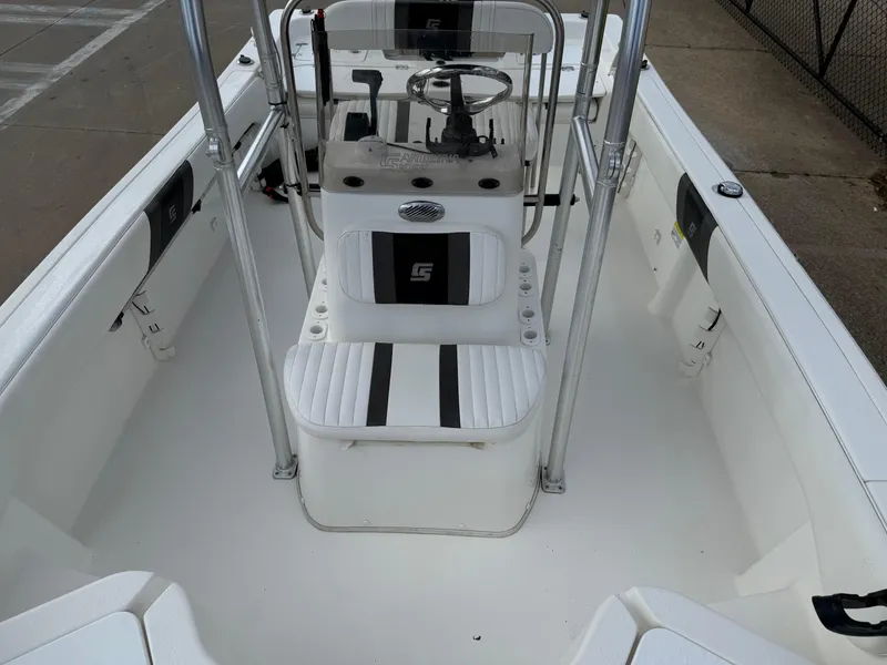 Slide: The Image of 2012 Carolina Skiff 19 Ultra boat interior with center console and seating. - 23