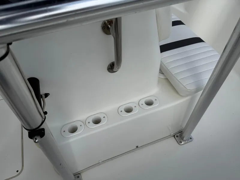 Slide: The Image of 2012 Carolina Skiff 19 Ultra boat interior with rod holders and seating. - 34