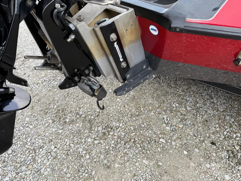 Slide: The Image of 2007 Ranger Z21 Comanche boat motor mount on gravel surface. - 3
