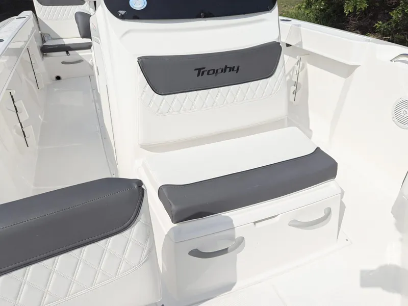 Slide: The Image of 2025 Bayliner Trophy T22CC boat interior with seating and storage, viewed from above. - 8