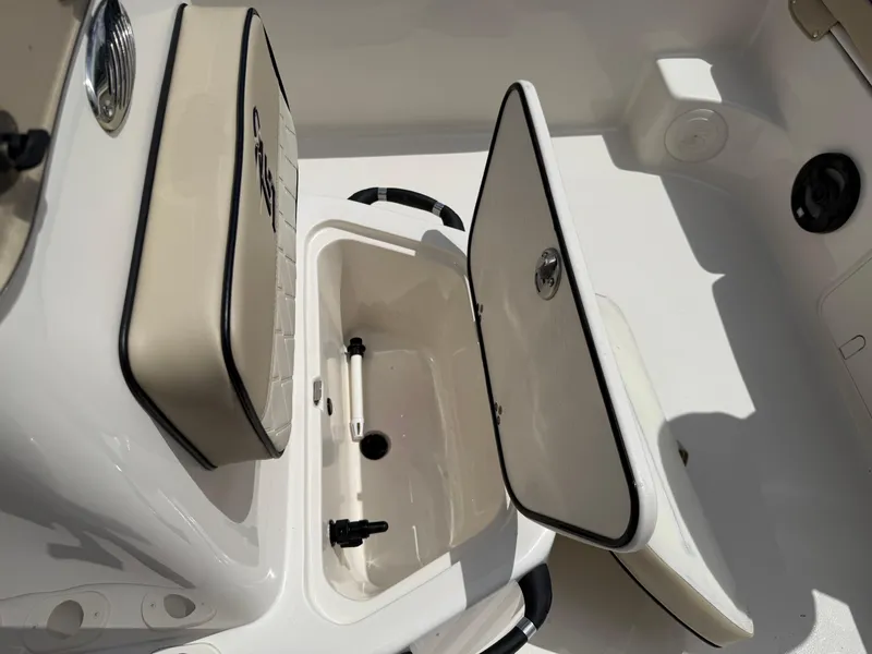Slide: The Image of 2022 Carolina Skiff 21 LS boat interior with open storage compartments. - 30