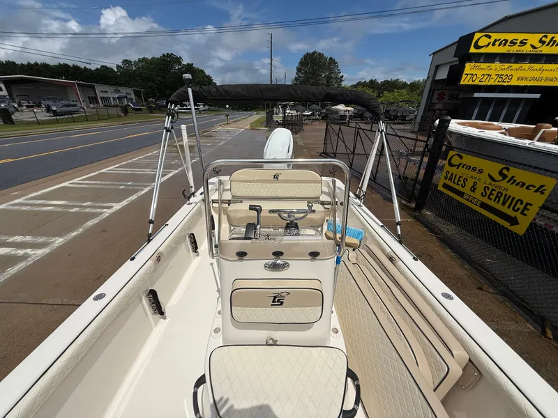 Slide: The Image of 2022 Carolina Skiff 21 LS boat at dealership, showcasing interior and console features. - 35