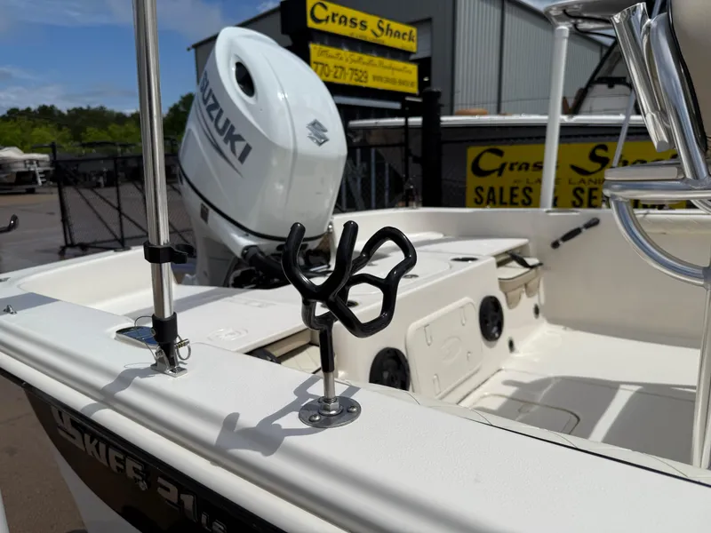 Slide: The Image of 2022 Carolina Skiff 21 LS boat with Suzuki engine at dealership. - 36