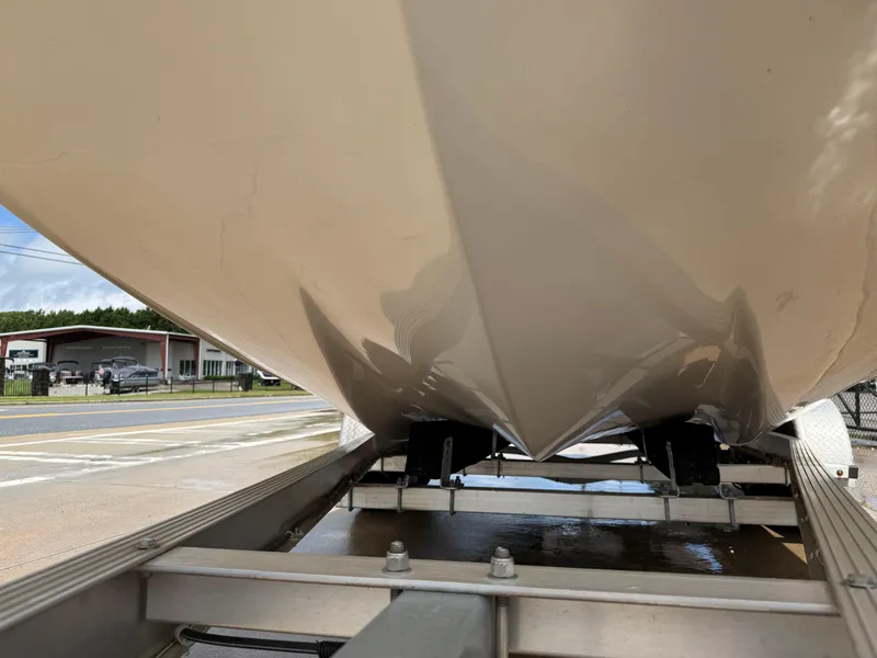Slide: The Image of 2022 Carolina Skiff 21 LS boat hull on trailer, viewed from below. - 43